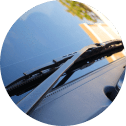 Close-up view of multiple car tires showcasing tread patterns, emphasizing durability and performance for automotive applications.
