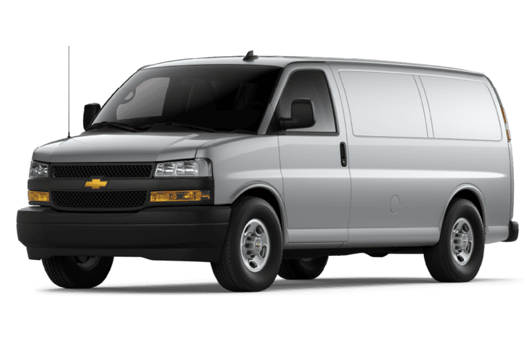 Silver Chevrolet Express van parked at an angle, showcasing its front and side view, highlighting its spacious design and commercial utility.