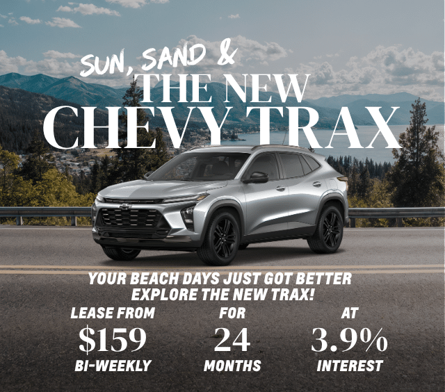 Silver Chevy Trax on a scenic road. Promo text: lease from $159 bi-weekly for 24 months at 3.9% interest.