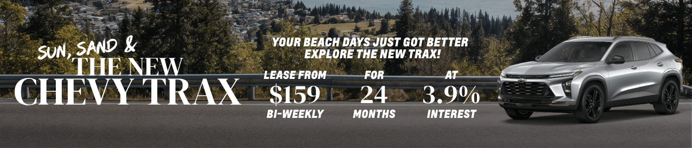 Silver Chevy Trax SUV displayed with lease terms: $159 bi-weekly for 24 months at 3.9% interest. Forest background.